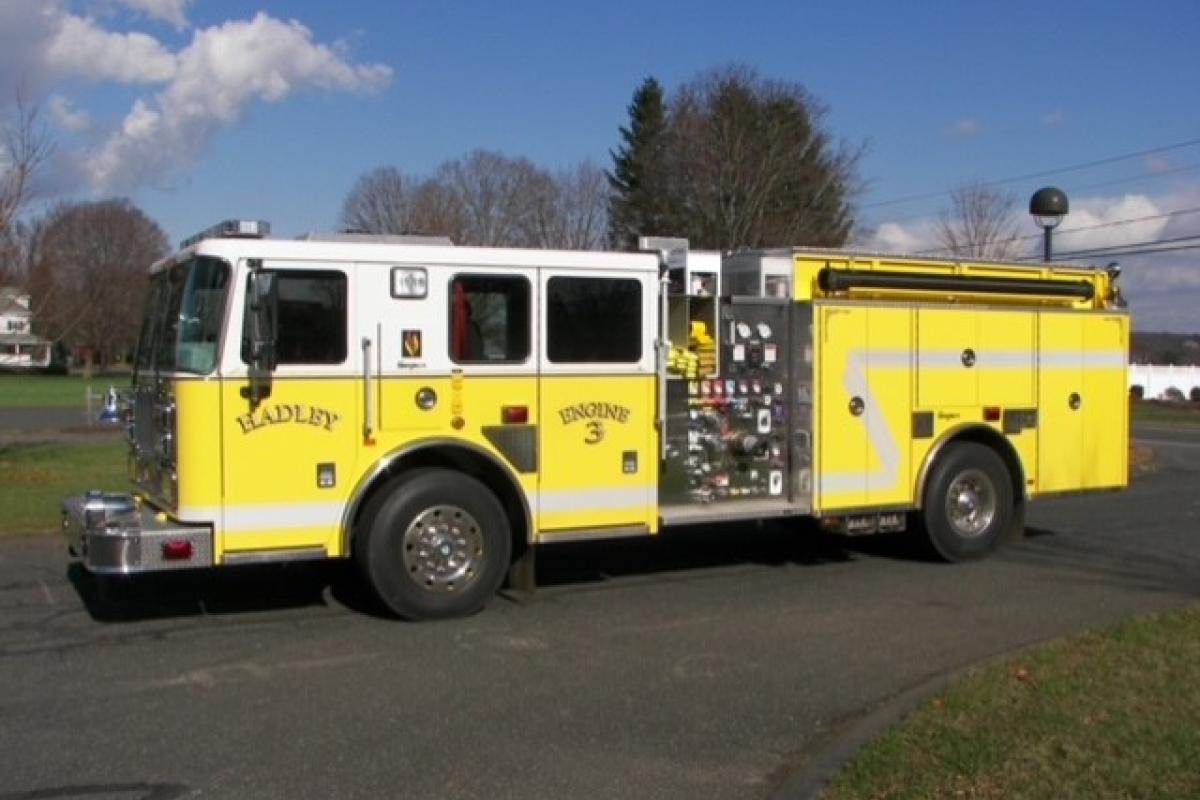 Yellow Hadley Fire Department's Engine 3 2006 Seagrave Marauder II Pumper, straight on drivers side of truck